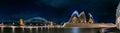 Panoramic view of the Sydney bridge and the Opera House at night. Royalty Free Stock Photo