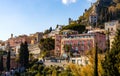 Panoramic view of Taormina historic old town with residential estates over Ionian sea shore in Messina region of Sicily in Italy Royalty Free Stock Photo