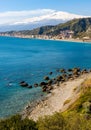 Taormina shore at Ionian sea with Giardini Naxos and Villagonia towns and Mount Etna volcano in Messina region of Sicily in Italy Royalty Free Stock Photo