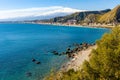 Taormina shore at Ionian sea with Giardini Naxos and Villagonia towns and Mount Etna volcano in Messina region of Sicily in Italy Royalty Free Stock Photo