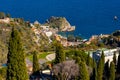 Taormina shore with Capo Mazzaro cape and residential estates over Ionian sea in Messina region of Sicily in Italy Royalty Free Stock Photo