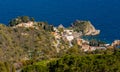 Taormina shore with Capo Mazzaro cape and residential estates over Ionian sea in Messina region of Sicily In Italy Royalty Free Stock Photo
