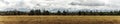 Panoramic view on Tatra Mountains, Poland seen from further. Snow-covered peaks of the rocky mountains and cloudy sky in the time Royalty Free Stock Photo