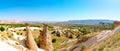 Panoramic view of Three Graces or Uc Guzeller in Cappadocia Urgup Turkey Royalty Free Stock Photo