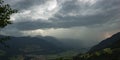 Panoramic view of a thunderstorm with lightning strike in the Alps Royalty Free Stock Photo