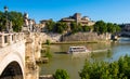 Tiber river and Lungotevere degli Altoviti embankment aside Ponte Sant`Angelo Saint Angel Bridge in Rome in Italy Royalty Free Stock Photo