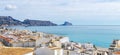 Panoramic view to beautifuly authentic small spanish village Altea, turquoise Mediterranean sea, mountains and blue sky