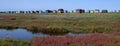 Panoramic view to the colorful beach huts at the Vestre Strandvej in ÃrÃ¸skÃ¸bing. Royalty Free Stock Photo