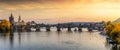 Panoramic view to the famous Charles Bridge over the river Vltava in Prague during sunset time Royalty Free Stock Photo