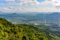 Panoramic view to mountains, tropical forest, Yanoda Park and Sanya city. Rainforest cultural tourism zone Yanoda, Hainan island, Royalty Free Stock Photo