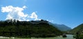 Panoramic view to Puna Tsang Chhu aka Sankosh river and Wangdue Phodrang Dzong, Bhutan Royalty Free Stock Photo