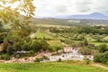 Panoramic view to Saturnia spa town with hot spring and waterfall at Cascate del Mulino (Mill waterfalls)