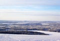 Panoramic view from top of mountain in winter landscape.