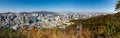 Namsan Mountain Park Cable Car as it descends past the view of the city Royalty Free Stock Photo