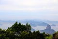 View of Rio de Janeiro from de the of Corcovado. In the blurred horizon hills, islands and the ocean.