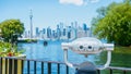 Panoramic view of Toronto skyline, Lake Ontario with binocular from island on a Royalty Free Stock Photo