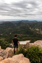 Panoramic View Of Tourist On Mountain Peak