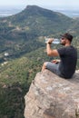 Panoramic View Of Tourist On Mountain Peak