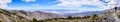 Panoramic view towards Badwater Basin from the trail to Telescope Peak, Death Valley National Park, hiker following a trail on the Royalty Free Stock Photo