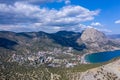 Panoramic view towards Green bay of Novy Svet New World location from top of Koba-Kaya Mountain, Sudak area, Crimea Royalty Free Stock Photo