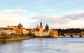 Panoramic view of the tower with a clock on the river vatslav mala strana part of the stone bridge. Prague Czech Republic March