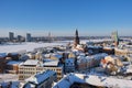 Panoramic view from tower of Saint Peters Church on Riga Cathedral and roofs of old houses in old city of Riga, Latvia in winter Royalty Free Stock Photo