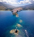 Panoramic view of the town of Andros island, Cyclades, Greece, with the famous Lighthouse