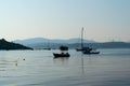 Panoramic view of town Sigacik with boats and sea