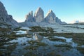 A panoramic view on the Tre Cime di Lavaredo (Drei Zinnen), mountains in Italian Dolomites. Royalty Free Stock Photo