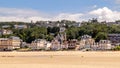 Panoramic view of Trouville coastline with typical norman architecture luxury buildings along the sandy beach. Normandy, France.. Royalty Free Stock Photo