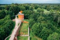 Panoramic view of Turaida Castle ruins with green forest in Sigulda, Latvia