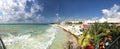 Panoramic view of turquoise beach, hotels and bar