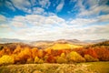 Panoramic view of Ukraine countryside, lonely windy tree, rolling hills and green fields at sunset. Carpathians, Synevyr Royalty Free Stock Photo