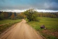 Country road in fall season. Latvia Royalty Free Stock Photo