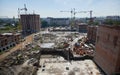 Construction site with apartment buildings and tower cranes. Royalty Free Stock Photo