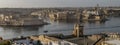 Panoramic view of Valletta and the three cities separated by the bay, at first light in the morning, Malta Royalty Free Stock Photo