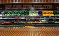 Panoramic view of vegetable stall counter in supermarket