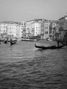 panoramic view of a Venice canal with water taxi and gondola