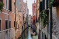 Panoramic view of Venice narrow canal with historical buildings and boat Royalty Free Stock Photo