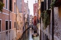 Panoramic view of Venice narrow canal with historical buildings and boat Royalty Free Stock Photo