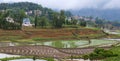 Village over terraced rice fields in Yuanyang, Yunnan Province of China Royalty Free Stock Photo