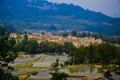 Panoramic view of Village of hani people over terraced rice fields in Yuanyang, Yunnan Province of China Royalty Free Stock Photo