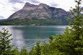 Panoramic view of Vimy Peak and green reflections on Upper Waterton Lake at Waterton Lakes National Park Royalty Free Stock Photo