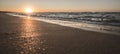 Panoramic view of a warm summer sunset on the Black Sea coast with stormy violent waves