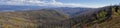 Wasatch mountain range with burnt trees during wild fires in Utah