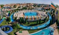 Panoramic view of Water park Action in Sunny Beach with number of slides and swimming pools for children and adults Royalty Free Stock Photo