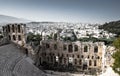 Panoramic view of white buildings and The Odeon of Herodes Atticus stone theatre under Acropolis in Athens, Greece Royalty Free Stock Photo