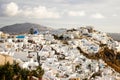 A panoramic view of the white city with blue roofs