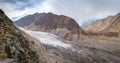 Panoramic view of white Passu glacier. Gojal Hunza. Gilgit Baltistan, Pakistan. Royalty Free Stock Photo