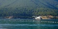 Panoramic view. White snow Beach and tropical sea in sunrise, Bodrum, Turkey. No people. Banner Lux vacation. Clear Royalty Free Stock Photo